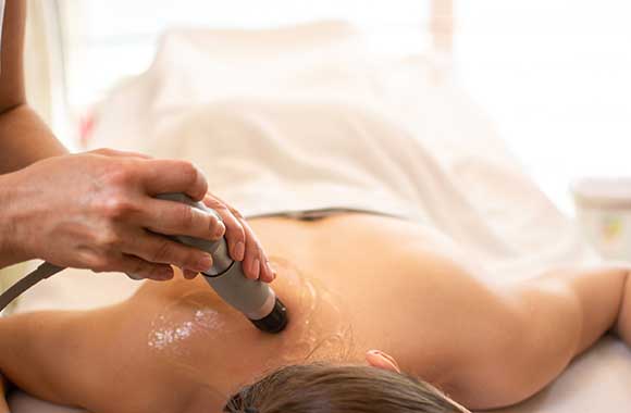 Women getting shockwave treatment
